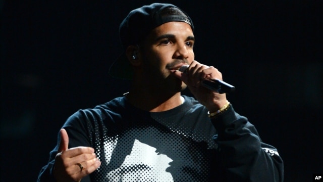 FILE - This Sept. 21, 2013 file photo shows Drake performing at the iHeartRadio Music Festival in Las Vegas. 