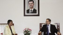 UN Under-Secretary-General for Humanitarian Affairs and Emergency Relief Coordinator, Valerie Amos, meets with Faisal Mekdad Syrian Ambassador to UN, during a press conference in Damascus, Syria, August 14, 2012.