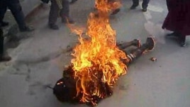 This still image allegedly shows the self-immolation of an individual along a street in Dawu, Ganzi prefecture in Sichuan province.