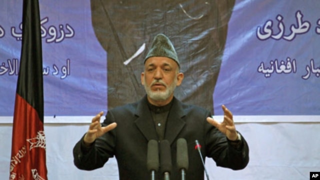 Afghan President Hamid Karzai speaks during a gathering in Kabul, Afghanistan, April 17, 2012.