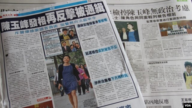 香港媒体跟踪报道占领中环运动核心成员陈玉峰遭检控事件（美国之音海彦拍摄）