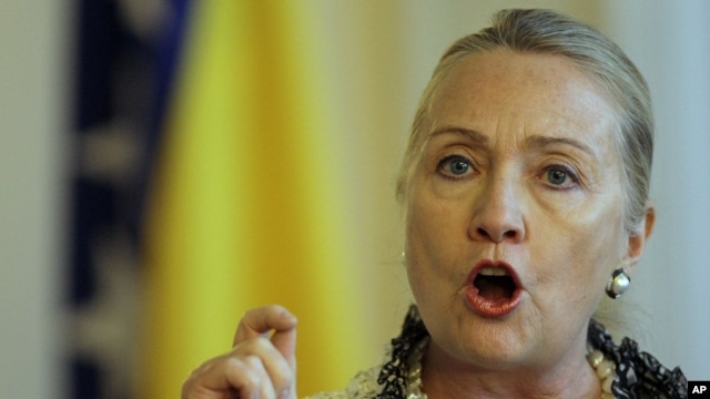 US Secretary of State Hillary Rodham Clinton gestures as she addresses journalists after meeting with the High Representative for EU Foreign Policy Catherine Ashton in Sarajevo, Bosnia, Oct. 30, 2012.