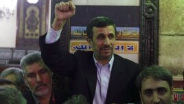  Iran's President Mahmoud Ahmadinejad (C) gestures in front of the shrine of Prophet Muhammad's grandson Hussein ibn Ali at the Al-Hussein mosque, in old Cairo, Egypt, Feb. 5, 2013.