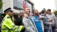 People heckle the Mayor of London, Boris Johnson, not pictured, as he leave the scene of a terror attack in Woolwich, southeast London, May 23, 2013.