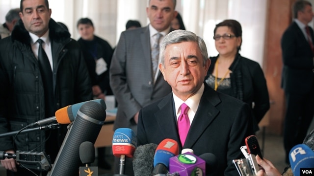 Armenia's President Serzh Sargsyan talks to reporters after casting ballot (Vera Undritz for VOA