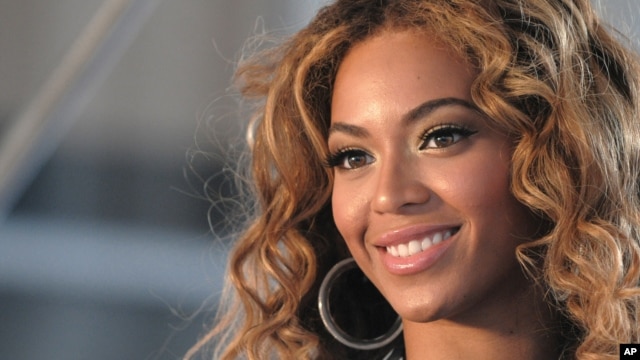 Beyoncé poses for pictures at a press conference June 22, 2009 in New York. 