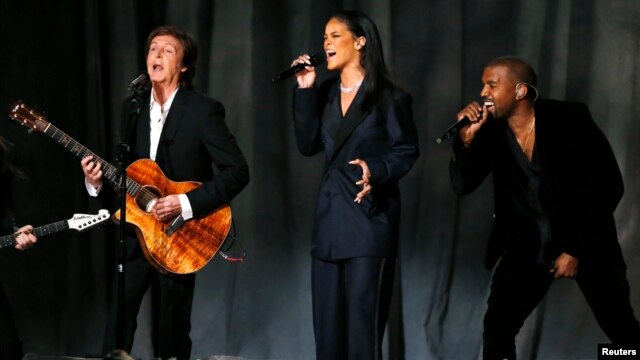 From left, Paul McCartney, Rihanna and Kanye West perform 