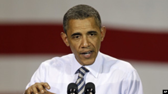 President Barack Obama speaks to workers at the Alcoa Davenport Works factory in Bettendorf, Iowa, June 28, 2011