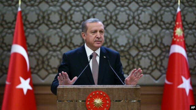 FILE - Turkish President Recep Tayyip Erdogan speaks to local administrators at his palace in Ankara, Turkey, Nov. 26, 2015. He voiced regret Nov. 28 about Turkey's downing of a Russian warplane.