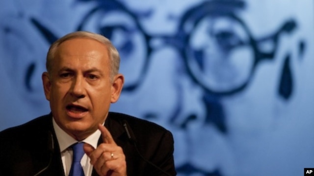 Israeli Prime Minister Benjamin Netanyahu delivers a speech to his Likud party members in Tel Aviv, Israel, Sunday, May 6, 2012.