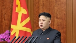 Shugaban Koriya ta Arewa kennan, Kim Jong Un a lokacin da yake jawabin sabuwar shekara. Junairu 1, 2013.  