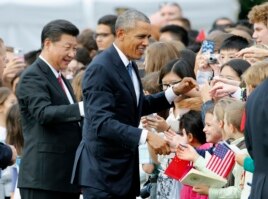 Students from D.C. Chinese immersion school meet Presidents Xi and Obama. (AP PHOTO)