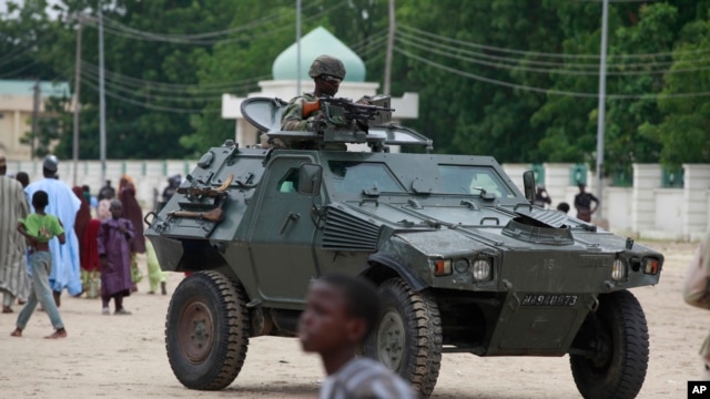 FILE - Nigerian army's armored vehicle in Maiduguri, Nigeria. 