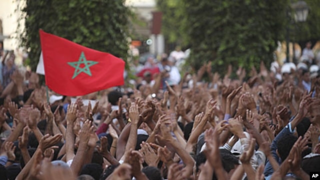 Protesters rally during a demonstration organized by the February 20 movement in Rabat, July 3, 2011.