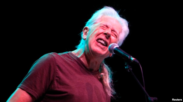 FILE - Blues legend John Mayall performs during a concert in Bucharest, Romania, Nov. 11, 2012.