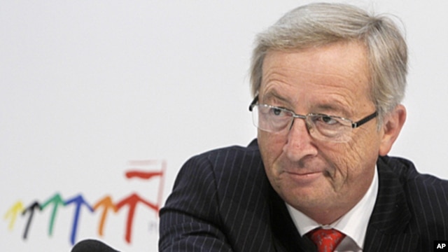 The head of Eurozone finance ministers' group, Jean-Claude Juncker, addresses the media during a news conference in Wroclaw, Poland, September 16, 2011.