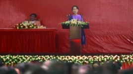 Burma's pro-democracy leader Aung San Suu Kyi delivers her speech at the National League for Democracy party's congress March 10, 2013.
