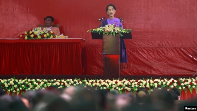 Burma's pro-democracy leader Aung San Suu Kyi delivers her speech at the National League for Democracy party's congress in Yangon March 10, 2013.
