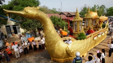 A chariot carrying a golden urn makes its way during a procession in Oudong, Kandal province, northwest of Phnom Penh, Cambodia.