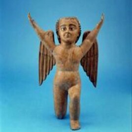 This cherub from the museum’s collection was fashioned of painted wood and glass eyes in the mid-1700s, after Spanish Catholics had introduced the concept of angels.