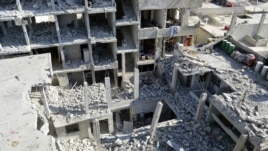 Konstriksyon ki kraze nan konfli siryen an. Se travay aviyasyon militè peyi a kap defann rejim Prezidan Bashar al-Assad la