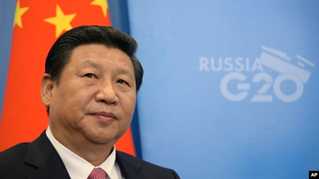 2013年9月5日中国国家主席习近平来到俄罗斯的圣彼得堡参加20国集团峰会的照片。
