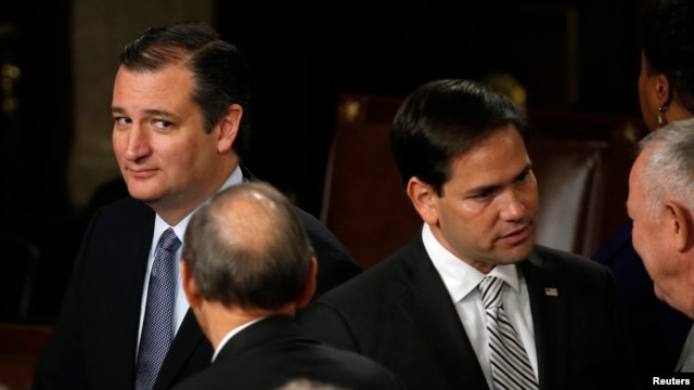 FILE - Republican Senators Ted Cruz and Marco Rubio are seen in the House of Representatives Chamber of the US Capitol after Pope Francis' address Sept. 24, 2015.