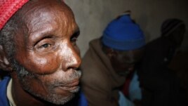 Elderly village residents like Bhasiqhongolo Dodwana are mostly in favor of the community rule designed to prevent alcohol-related violence (D. Taylor /VOA)