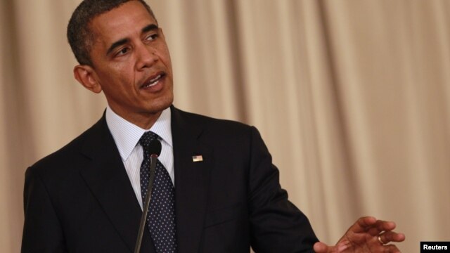 US President Barack Obama speaks during a joint media conference with Thai Prime Minister Yingluck Shinawatra at Government House in Bangkok, November 18, 2012.
