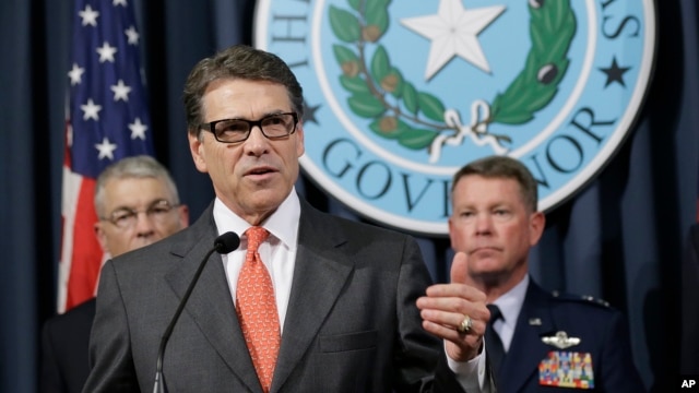 Thống đốc Rick Perry phát biểu trong cuộc họp báo tại Austin, Texas, ngày 21/7/2014.