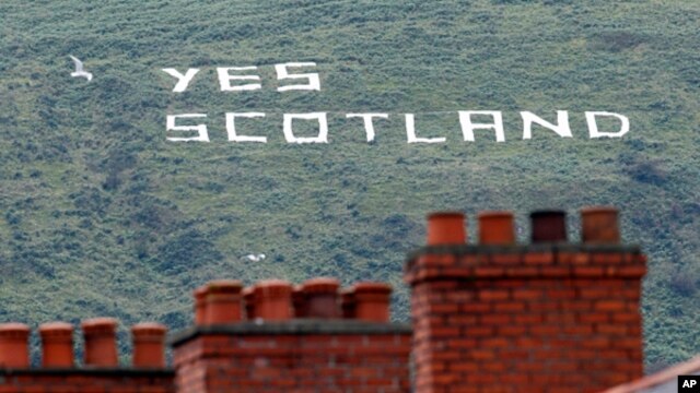 Republican writing supporting the Yes vote in the Scottish Referendum on a mountain in West Belfast, Northern Ireland, Sept. 8, 2014. 