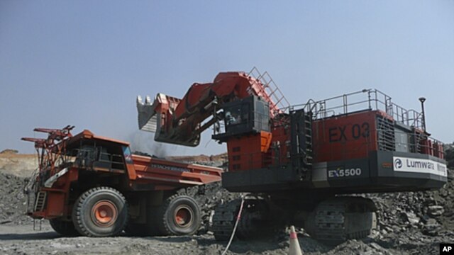 A truck is loaded with rocks at an Equinox copper mine in Lumwana, Zambia, in this undated handout obtained by Reuters, April 4, 2011.