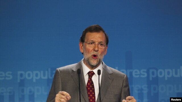 Spain's Prime Minister Mariano Rajoy speaks during a news conference at his Popular Party headquarters in Madrid, May 28, 2012. 
