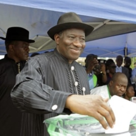 Nigerian President Goodluck Jonathan casts his ballot in his home village of Otuoke, Bayelsa state.