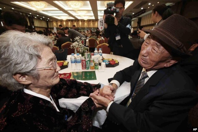 South Korean Kim Bock-rack, right, meets with his North Korean sister Kim Jeon Soon during the Separated Family Reunion Meeting at Diamond Mountain resort in North Korea, Oct. 20, 2015.