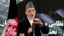 Afghan President Hamid Karzai speaks at a press conference during a ceremony at a military academy on the outskirts of Kabul, Afghanistan, June 18, 2013. 