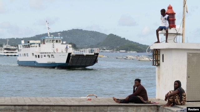 A boat arrives at Dzaoudzi on the Indian Ocean island of Mayotte, March 31, 2012.  