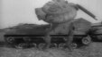  Members of the Ghost Army work with an inflatable tank, one of hundreds of props used to deceive the enemy during World War ll. (Courtesy Plate of Peas Productions)
