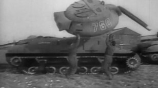  Members of the Ghost Army work with an inflatable tank, one of hundreds of props used to deceive the enemy during World War ll. (Courtesy Plate of Peas Productions)