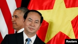 U.S. President Barack Obama attends a press conference with Vietnam's President Tran Dai Quang at the Presidential Palace in Hanoi, Vietnam May 23, 2016. 