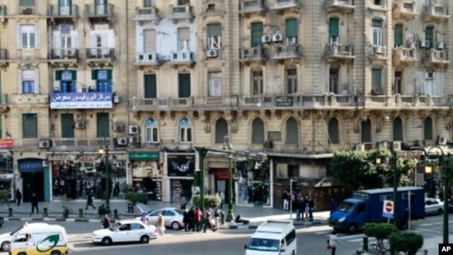The balcony of the Cairo Inn in central Cairo overlooks busy Talat Harb Square, only a short walk from iconic Tahrir Square, December 14, 2011.