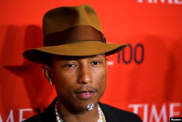 Honoree and singer Pharrell Williams arrives at the Time 100 gala celebrating the magazine's naming of the 100 most influential people in the world for the past year, in New York April 29, 2014.
