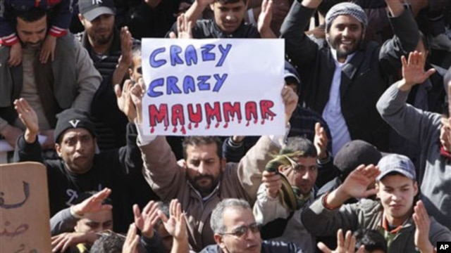Libyan protesters protest against Libyan leader Moammar Gadhafi, in Tobruk, Libya, February 23, 2011
