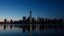 One World Trade Center in New York is reflected in the Hudson River as seen from Jersey City, New Jersey, May 10, 2013.
