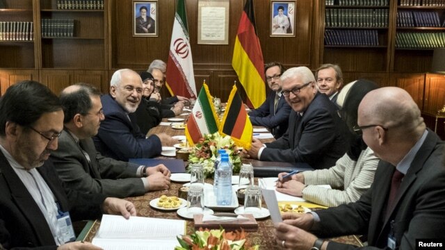 Iranian Foreign Minister Mohammad Javad Zarif, third from left, attends a meeting with his German counterpart Frank-Walter Steinmeier, third from right, in Tehran, Oct. 17, 2015.  