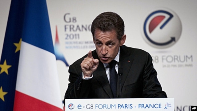 France's President Nicolas Sarkozy gestures, during a e-G8 conference, gathering Internet and information technologies leaders and experts,  in Paris, May 24, 2011.