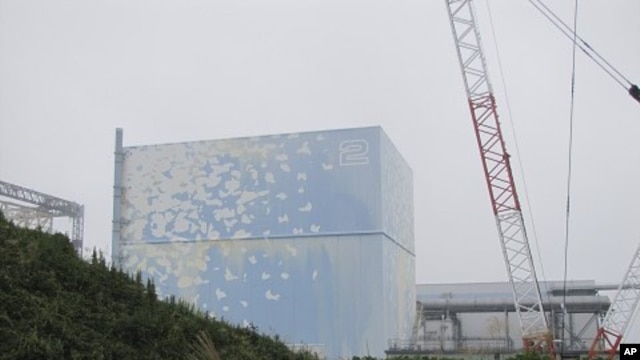 Tokyo Electric Power Co. (TEPCO)'s tsunami-crippled Fukushima Daiichi Nuclear Power Plant No. 2 reactor building, September 15, 2011.