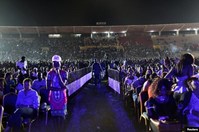 Fans of Nigerian pop star Wizkid wait for him to perform at a concert in Bamako, Mali, Nov. 15, 2015.