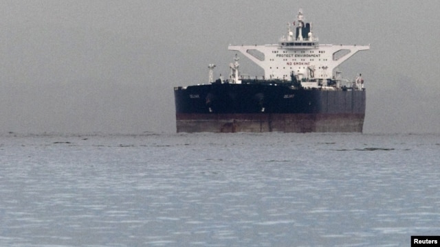 Malta-flagged Iranian crude oil supertanker "Delvar" is seen anchored off Singapore on March 1, 2012. Western trade sanctions against Iran are strangling its oil exports even before they go into effect.