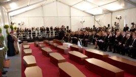 A funeral service for 24 migrants who drowned while trying to reach the Southern coasts of Italy. The funeral was held in Valletta, Malta on April 23, 2015. (AP PHOTO)